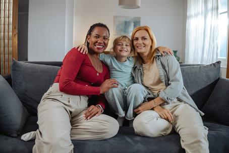 couple with adopted child at home