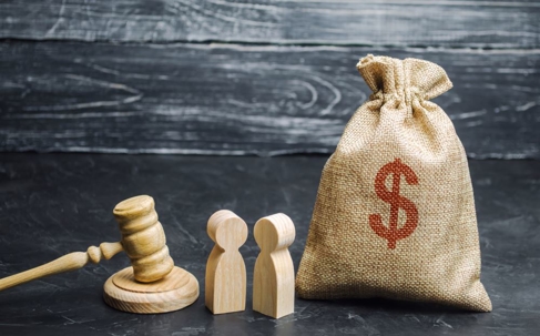 gavel with bag of money